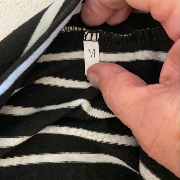 Adorable and soft knit top with striped tie and striped sleeves. Classic look. - Picture 5 of 6